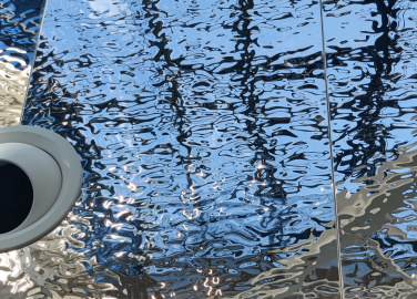 Корпоративный университет НЛМК, облицовка атриума нержавеющая сталь AquaSteel