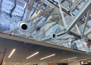 Корпоративный университет НЛМК, облицовка атриума нержавеющая сталь AquaSteel